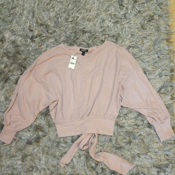 Express Tops - Express. Light pink crop top shirt with wrap tie on back. Size XS